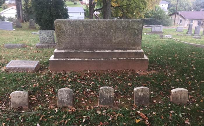 Wanda Carpenter photo - graves of girls killed in pres home fire